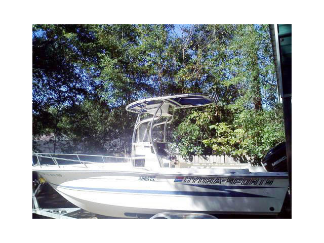 1990 HydraSports Vector 2200 CC center console boat with universal ttop by Stryker T-Tops installed