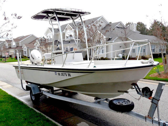 Boston Whaler center console boat with universal ttop by Stryker T-Tops installed